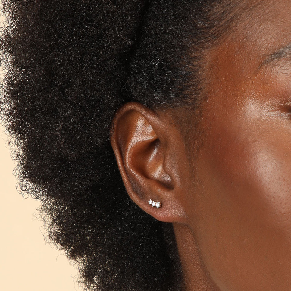 Glimmer Crystal Climber Stud Earrings in Gold worn